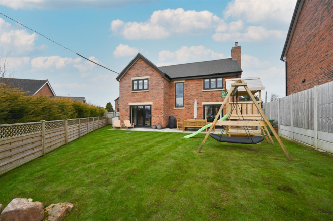 Patio and gardens to rear