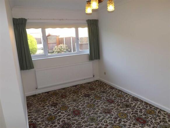 BEDROOM THREE/DINING