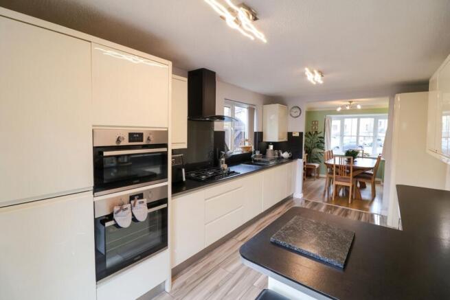 Kitchen opening to dining room