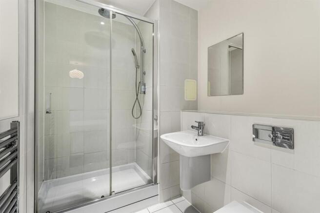 Experience ultimate relaxation in this contemporary bathroom with stylish finishes.
