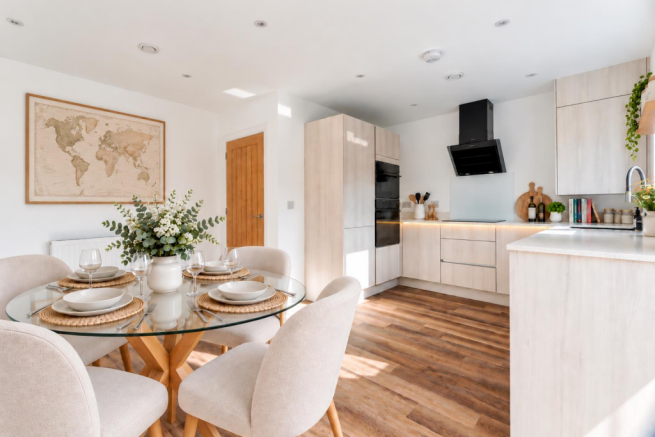 Bright virtual-staged kitchen diner-4.png