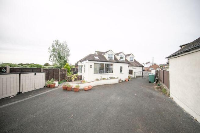 Side elevation & driveway