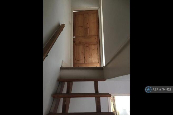 Stairs And Door To Main Bedroom