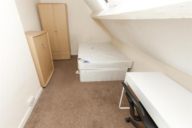 Cozy bedroom with ample storage and study desk...