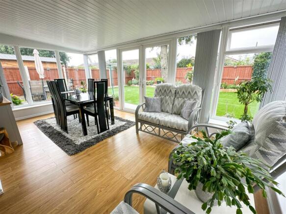 ALTERNATE VIEW OF SITTING/DINING ROOM
