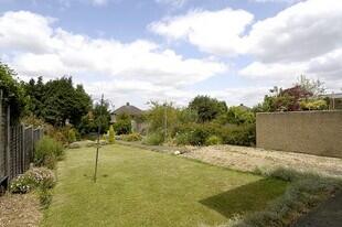 Pleasant rear lawn