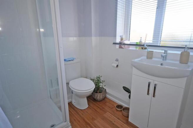 EN-SUITE SHOWER ROOM