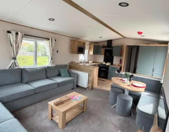 Spacious Modern Lounge With Corner Seating And Adj