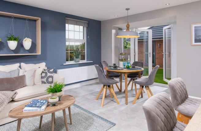Internal view of a large open plan kitchen with french doors