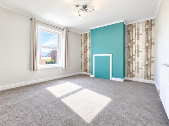 Bright Teal Feature Wall Interior.png