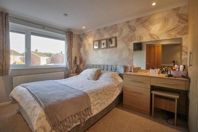 BEDROOM ONE TO FRONT