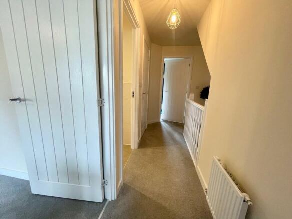 TO THE FIRST FLOOR LANDING
