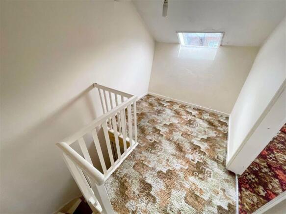 Stairs to second floor landing
