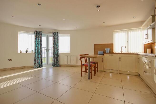 LIVING ROOM WITH KITCHEN AREA