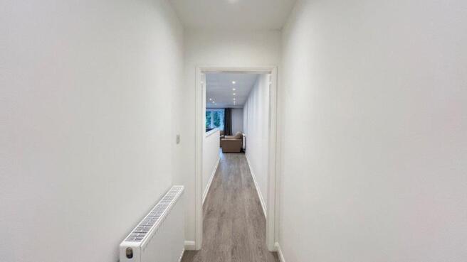 Bright, clean corridor with modern flooring...
