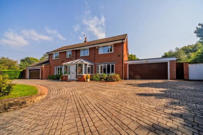 DRIVEWAY AND GARDENS