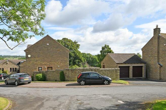 Side of Property & Double Garage