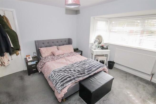 BEDROOM ONE  (FRONT)