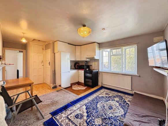Reception/kitchen/dining area