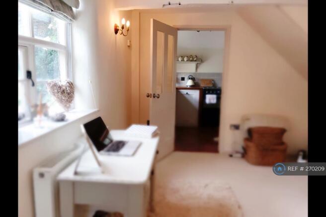 Lounge Leading Into Kitchen
