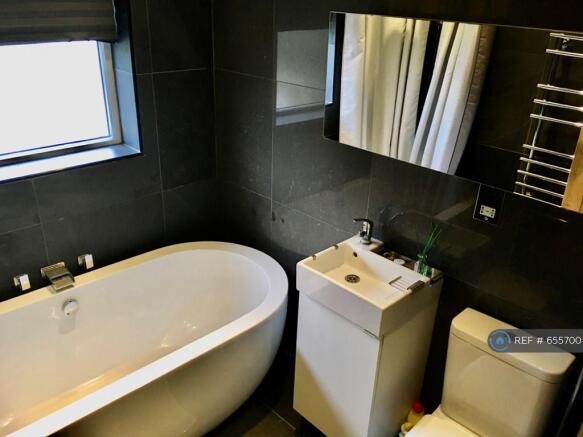 Bathroom With Overhead Rainwater Shower