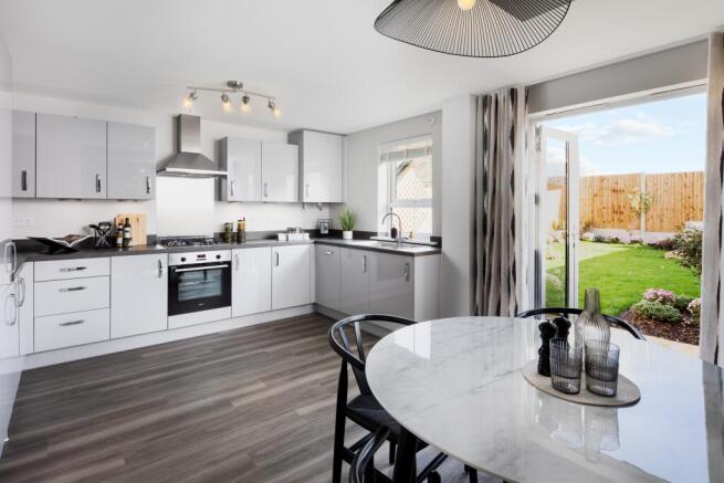 Open plan kitchen with dining area in the Maidstone 3 bedroom home