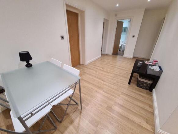 A bright and clean contemporary living room wit...