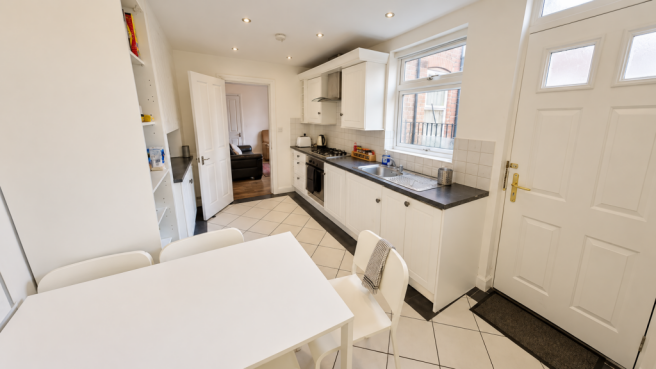 Bright Modern Galley Kitchen Dining Area