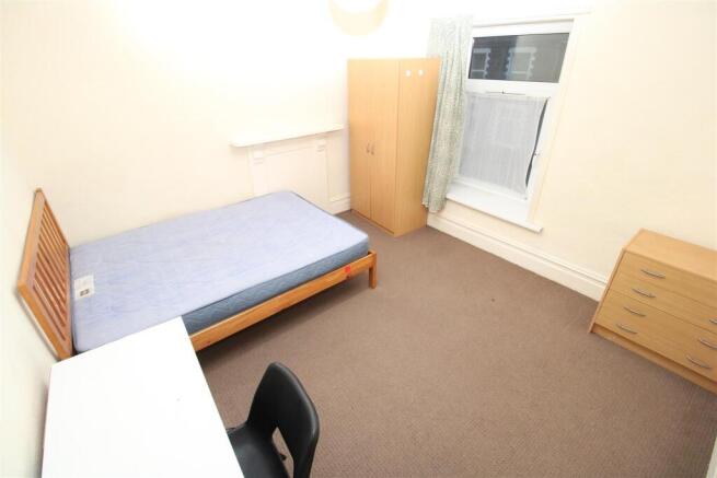 Bright double bedroom with ample storage space...