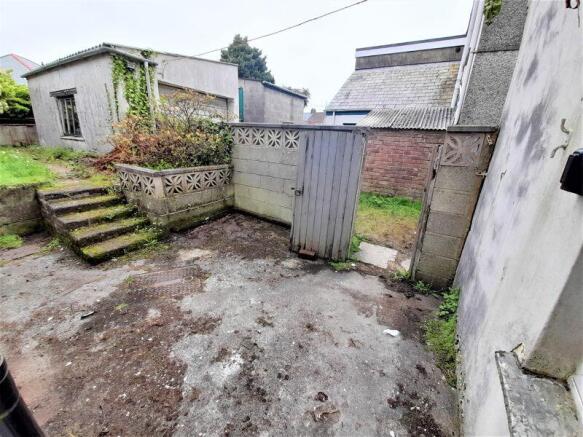 Courtyard and Side Access to Drive