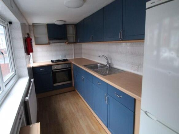 A neat and well-maintained kitchen featuring am...