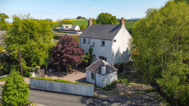 Front Elevation, Driveway and Gardens
