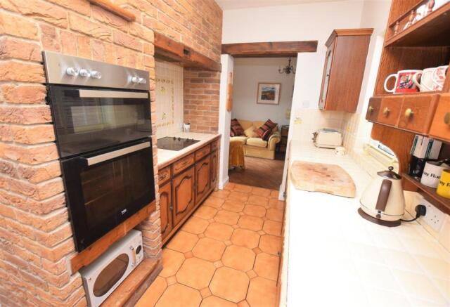 Living-dining-kitchen, kitchen with oven looking t