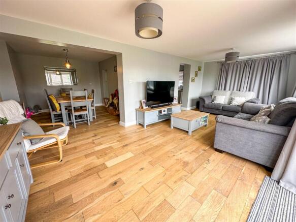 ALTERNATE VIEW OF LOUNGE & DINING ROOM
