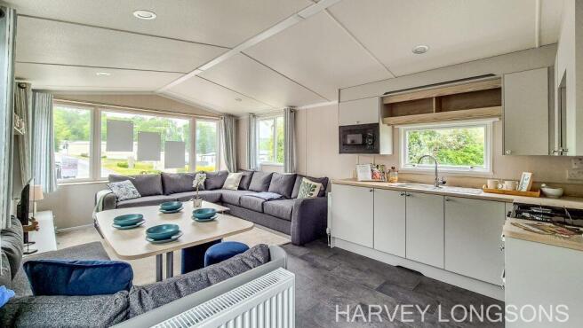 Open plan lounge and kitchen in the Swift Loire ho