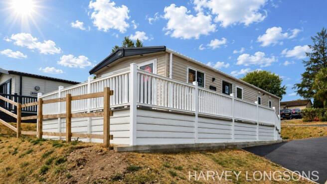 ABI Kingston holiday lodge exterior with decking.