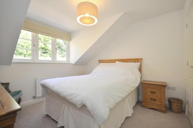 Bedroom three with built in wardrobes