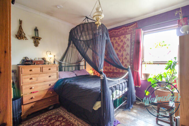 Rear double bedroom with access to loft studio