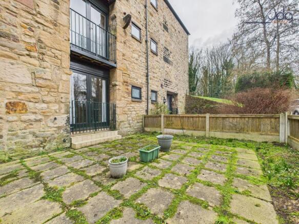 Spacious flagged, west facing garden