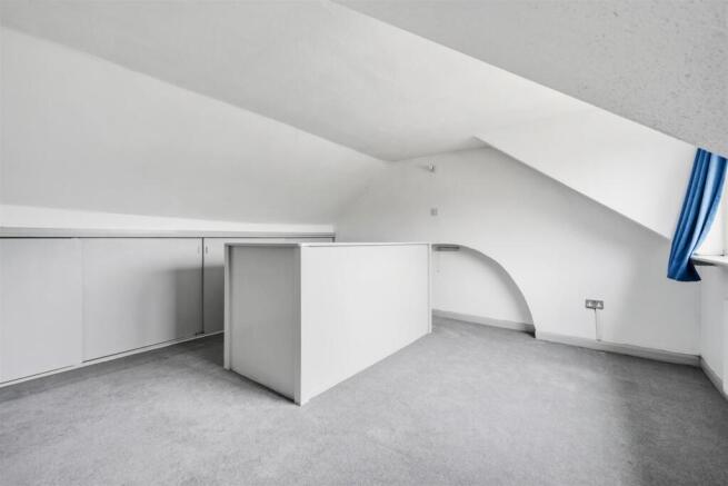 Loft Room to staircase and arch.jpg