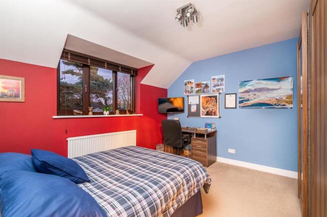 BEDROOM THREE (Red & Blue walls)