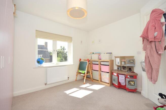Bedroom two with built in wardrobes