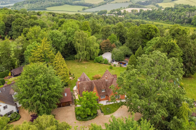 House, garden and woodland to the rear