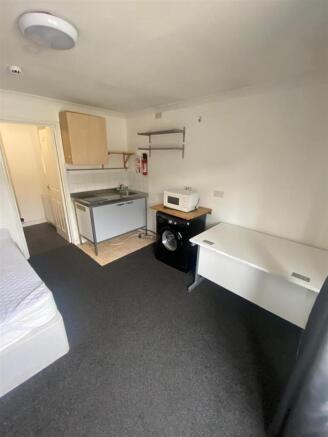 Practical studio space with laundry facilities...