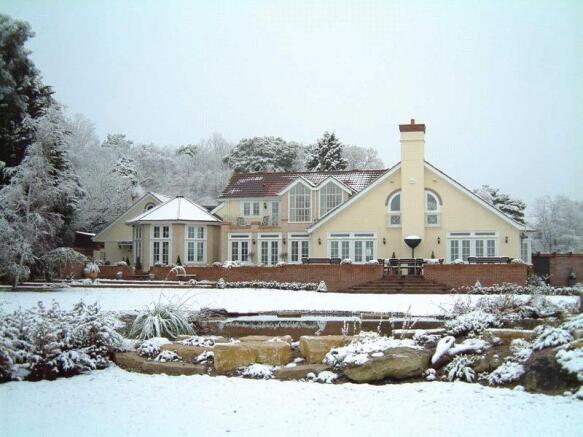 House In Snow