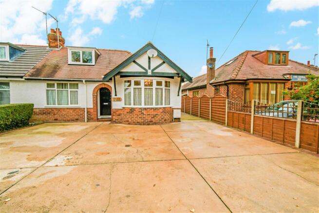 To the front of the house