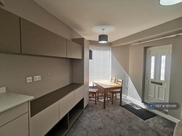Living Area And Front Door