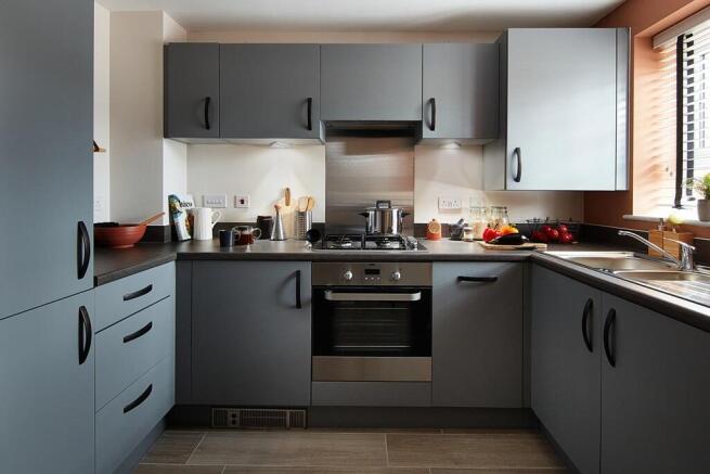 The kitchen features ample storage