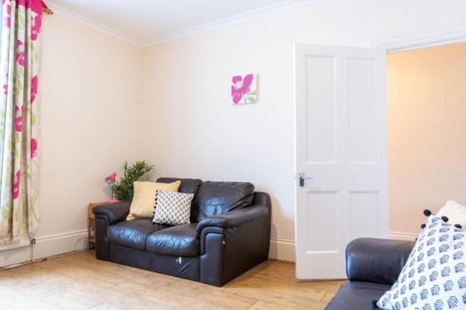 Bright, tidy living room with hardwood floors, ...