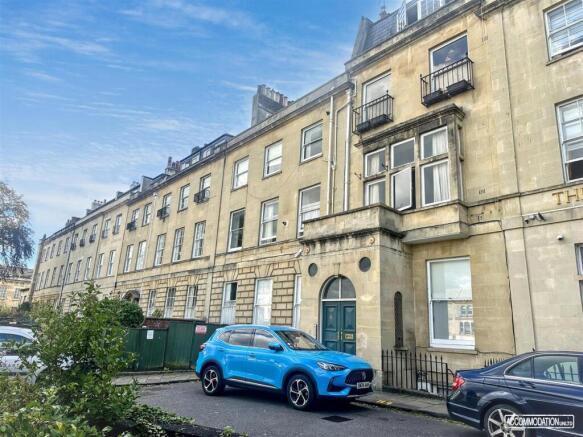 Charming Georgian stone terraced facade...